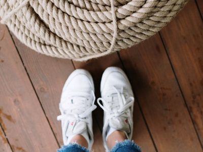 Stretching ropes on a wooden floor background